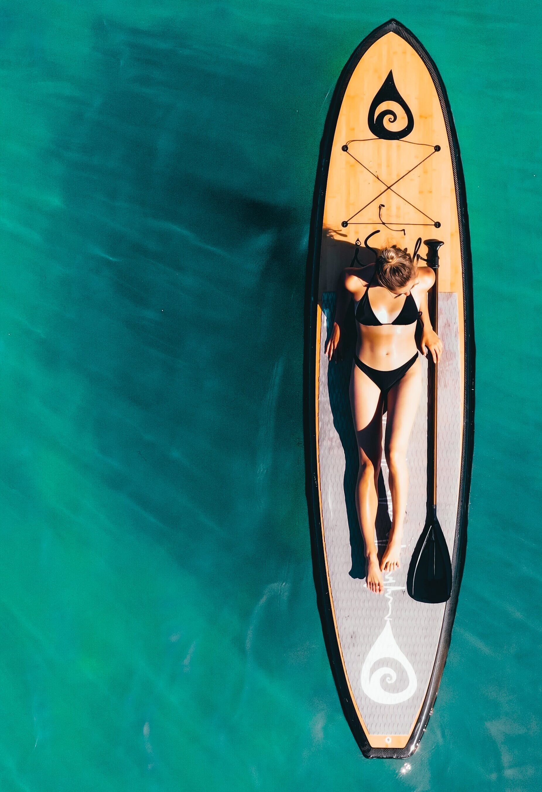a woman sitting on a sup